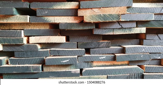 Stack Of Ash Wood Bars At The Lumber Yard.