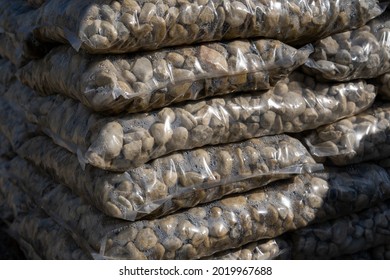 Stack of Bags with Pebbles - Shutterstock ID 2019967688