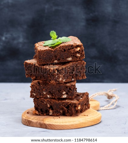 Similar – quadratische Stücke Schokoladenbrownie