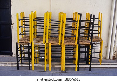 Stack of bar stools from a mediterranean cafe bar