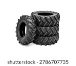 Stack of black tractor tires isolated on white background.