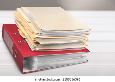 Stack Of Blank Paper With Binder Clips On Table Indoors