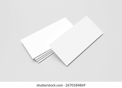 Stack of blank white DL flyers or brochures for mockup isolated on light grey background