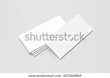 Stack of blank white DL flyers or brochures for mockup isolated on light grey background