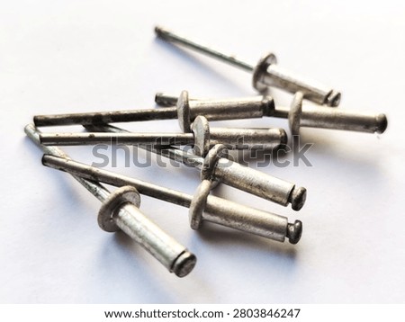Stack of blind metal rivets. Rivet nail, isolated on white