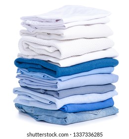 Stack blue jeans and white blue shirt, sweater, t-shirt clothes on white background isolation