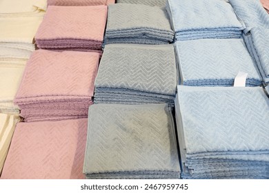 A stack of blue and pink towels, background