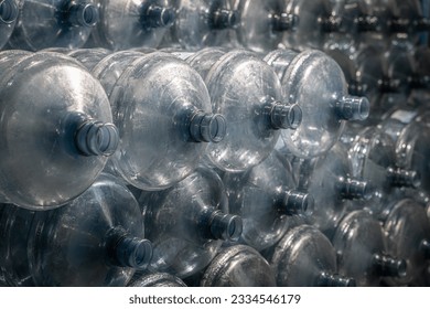 stack of blue plastic bottles