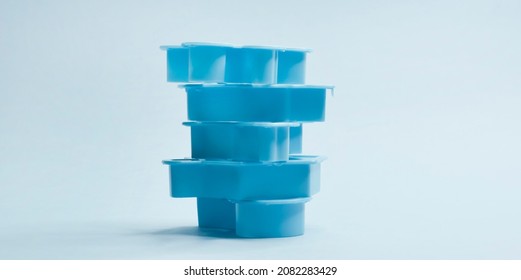 Stack Of Blue Plastic Cookie Cutters