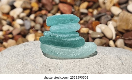 A stack of Blue Seaglass finding on the beach of Korinthe in Greece