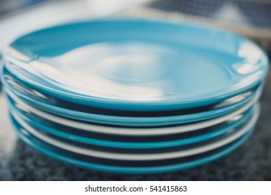stack of blue and white plates, close up
