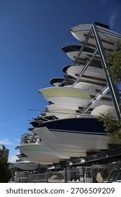 Stack of Boats on a Storage Rack