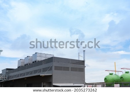 Stack boiler and chiller on top roof building released smoke.Environment concept.