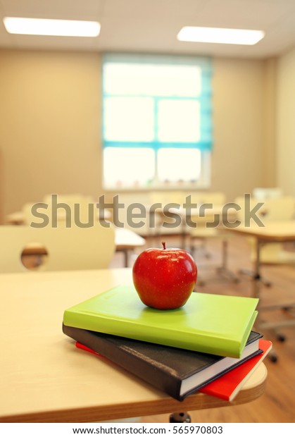 Stack Books Apple On Desk Classroom Stock Photo 565970803 | Shutterstock