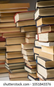 Stack of books background. many books piles.