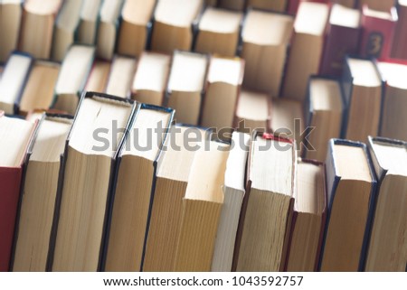 Stack of books background. many books piles.