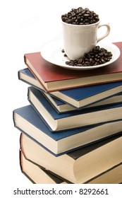 Stack of books and a cup of coffee