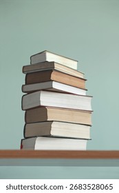 A stack of books from different angles