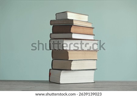 A stack of books from different angles