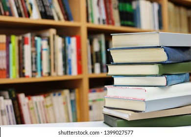 Book Stack On Wood Desk Blurred Stock Photo 1017025384 | Shutterstock