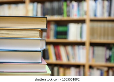 Book Stack On Wood Desk Blurred Stock Photo (Edit Now) 569895262