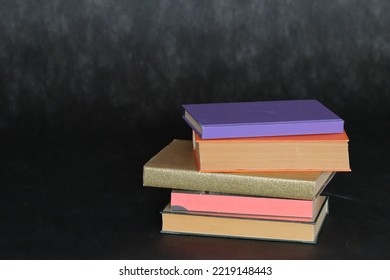 Stack Of Books On Black