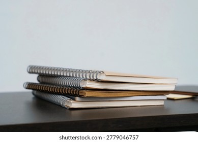 stack of books on a desk