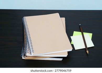 stack of books on a desk