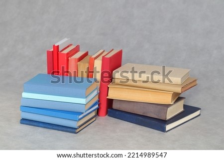 Stack of Books on gray background 