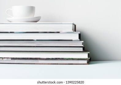 Stack of books on a light background. Leisure, reading, library, study concept