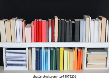 Stack Of Books On The Shelf In Library