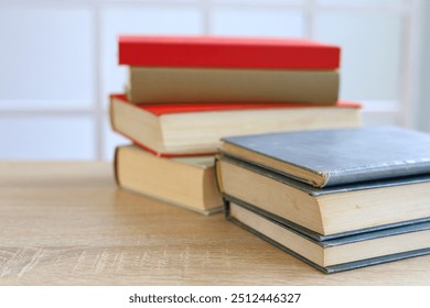 stack of books on table, education and learning concept, library, schol, academic