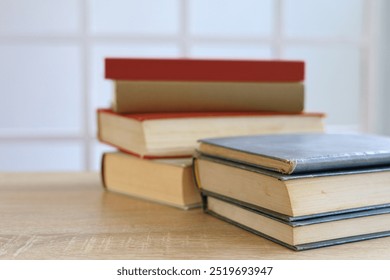 stack of books on table, education and learning concept, library, schol, academic