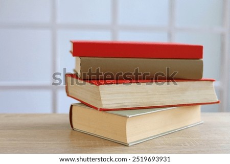 stack of books on table, education and learning concept, library, schol, academic