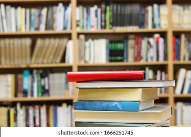 Stack of Books on the table in library
 - Shutterstock ID 1666251745