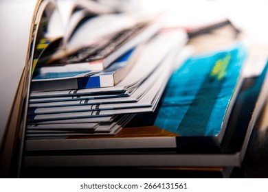 Stack of books on the table in library Shallow depth of field.