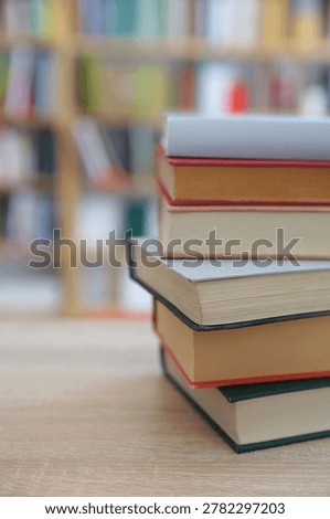 stack of books on the table in the library, High quality photos of books, education, Best Book Photo,
