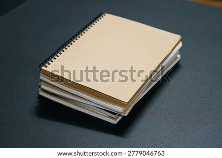 stack of books on a table, right high angle view of books