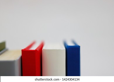 Stack of books on white