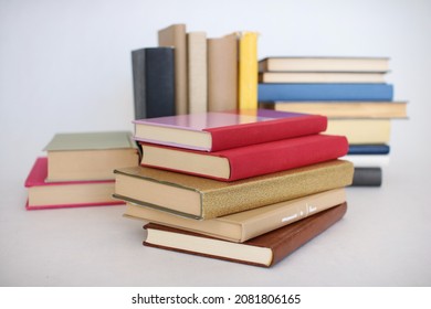 Stack of books on white