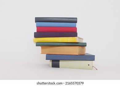 Stack of books on white