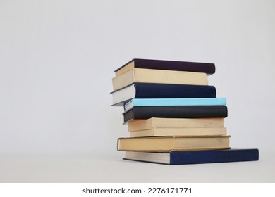 Stack of books on white
