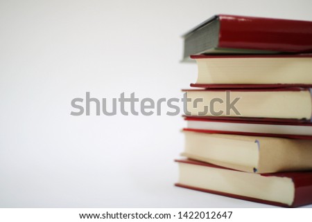 Stack of books on white