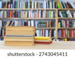 stack of books on white background, stack of books against the background of library, education, books on wooden table, high quality professional photography, High quality book photography, Best Book Photo, In the background,
The lighting is natural and soft, creating a warm, 
peaceful atmosphere typical of a space dedicated to study or reading.
A beautiful set of books by the world