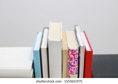 Stack of books on white background