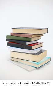 Stack Of Books On White Background