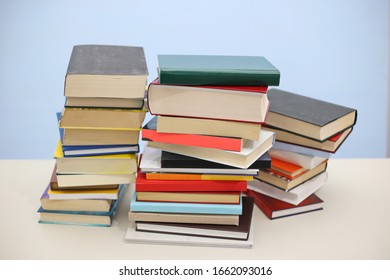 Stack of books on white background