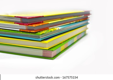 Stack of books on white background