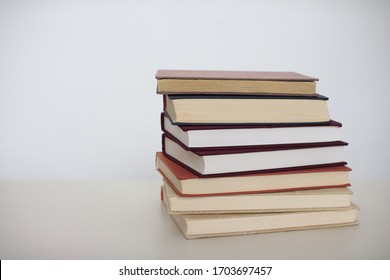 Stack Of Books On White Background