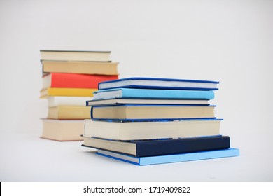 Stack Of Books On White Background